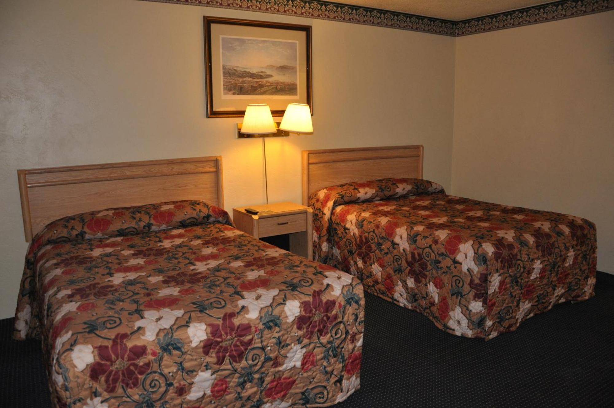Travelers Inn Мантека Номер фото